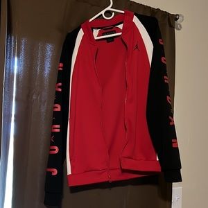 Jordan jacket size small in red, black and white